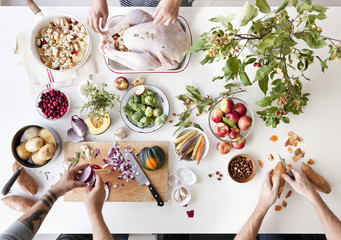Friends Cooking Turkey Dinner Together