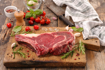 raw beef piece on board