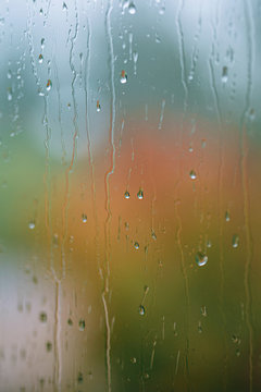 Rain on the window - pastel background