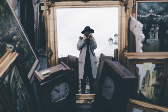 Photographer taking a selfie in the mirror