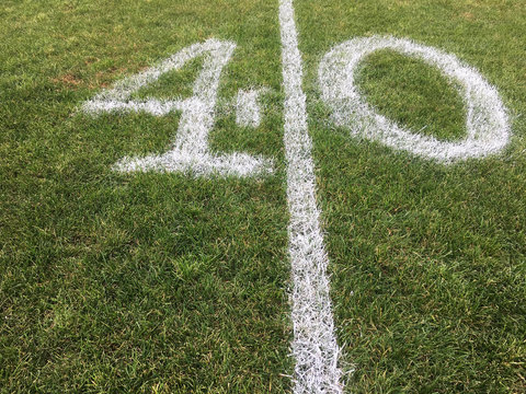 A Forty Yard Line Painted On A Grass Football Field