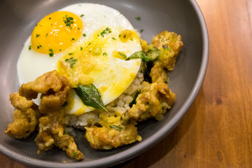 Butter rice with salted chicken crisp and fried egg