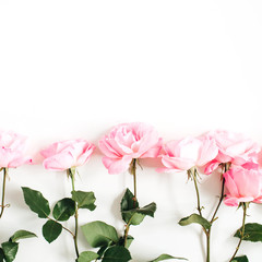 Naklejka na ściany i meble Pink roses on white background. Flat lay, top view. Valentine's background. Floral pattern. Pattern of flowers. Flowers pattern texture