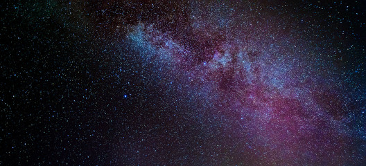 Fototapeta na wymiar A meteor streaks through the Milky