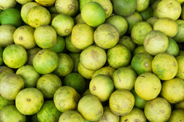 Top view fresh green lime at market thailand,healthy fruit concept