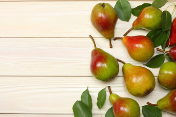 Apples and pears on the white wooden background. top view with copy space
