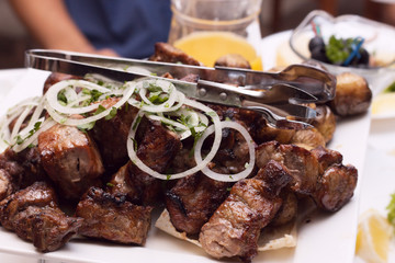 Meat cooked on charcoal