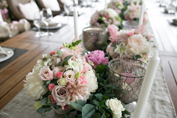 Luxury, elegant wedding reception table arrangement, floral centerpiece