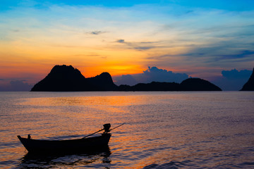 Bright colors at dawn on the beach at sunrise in the Gulf of Thailand.