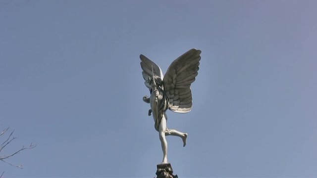The statue of Greek mythological figure Eros, in Sefton Park, Liverpool. This is an aluminium replica (2008) of the famous 1893 statue in Piccadilly Circus, London. This statue replaced a 1932 replica
