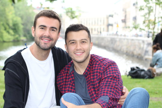 Beautiful homosexual couple in the park