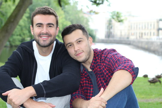 Beautiful homosexual couple in the park 