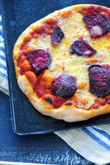 delicious homemade pizza on a platter - 167975306