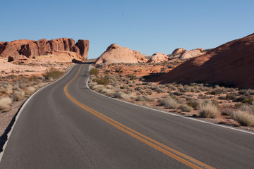 Highway through desert rocks