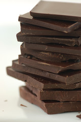 stacked chocolate over white background - 167977725