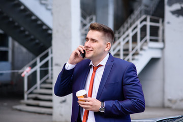 Businessman talking on the phone with a client.