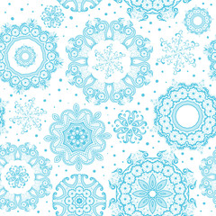 Seamless ornate blue snowflakes on white pattern. Background for Christmas and New year. Mandala lace snowflakes. Vector Illustration