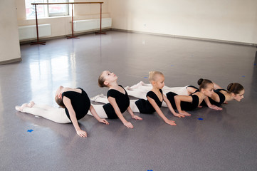 Fototapeta premium The choreographer teaches children dances.
