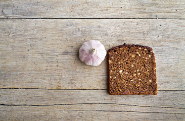 Whole grain brown bread and pungent garlic.