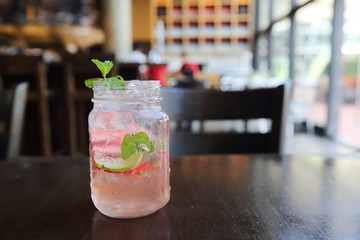 strawberry cocktail on wood background