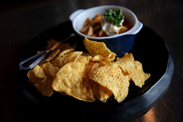 Nachos on dark tone , Mexican food