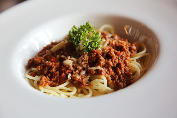 Spaghetti bolognese in dark tone