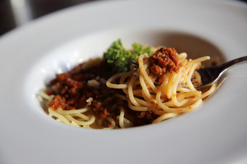 Spaghetti bolognese in dark tone
