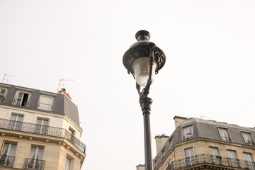 Fototapeta na wymiar Detail of old street lamp in a street in Paris