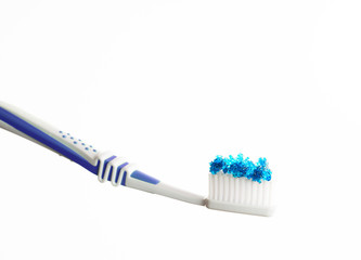 toothbrush with blue colored sugar