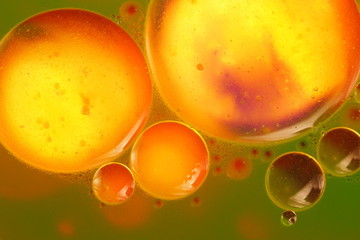 Abstract, colorful composition with oil, water and ink
