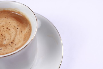 Cup of coffee made from fresh roasted coffee beans