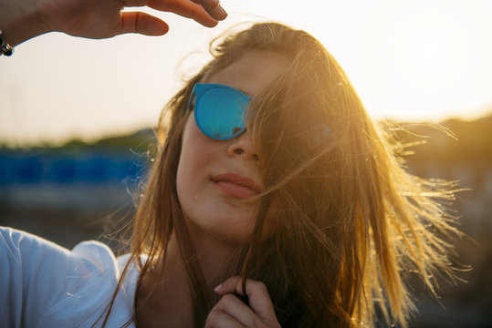 Young woman with flying hair