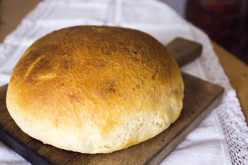 Homemade bread in wooden cutting board