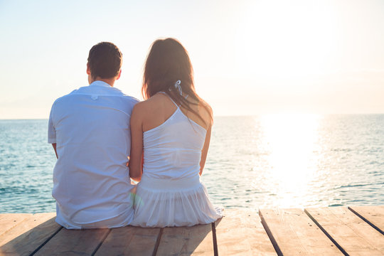 Young Couple By The Sea