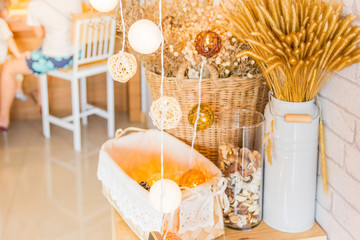 Home decoration, dried grass dry flower in utensil ware white indy home cafe decoration hipster style.  Cosy and soft winter background