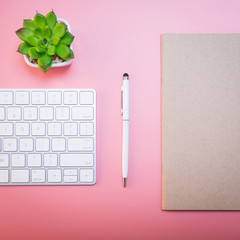 Looking for direction and inspiration, Creative flat lay of workspace desk, office stationery and lifestyle objects on pink background with copy space