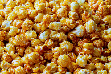 Hundreds popcorns background. Popcorns behind