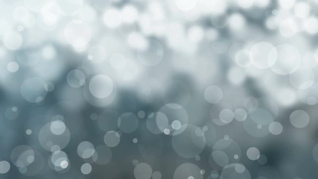Abstract Christmas, holiday background - seamless looping, 4K, silver, grey defocused blur bokeh light background