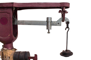 Weighing a kilo of steel pendulum on isolated.
