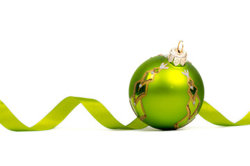 green christmas ball and ribbon on white background