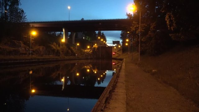View of the modern sluice on the Saimaa canal on a summer night