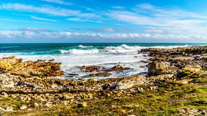 Waves of the Atlantic Ocean breaking on the rocky shores of Cape of Good Hope in Cape Point Nature Reserve on the Cape Peninsula in South Africa
