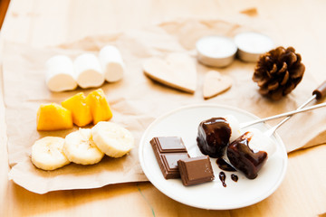 Set for fondue and chocolate with fruits
