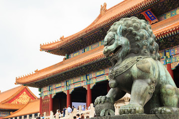 Lion statue guarding entrance to the Forbidden City in Beijing, China