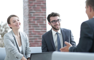 Fototapeta premium members of the business team talking to a client