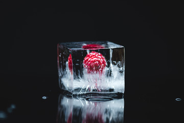 raspberry frozen in ice cube