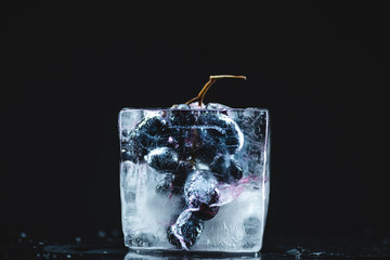 frozen grape in ice cube