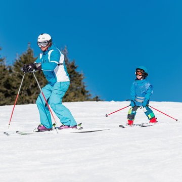 Father and son skiing