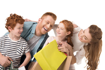 happy family with shopping bags