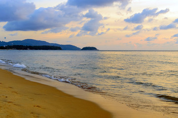 Golden sunrise sunset over the sea ocean waves